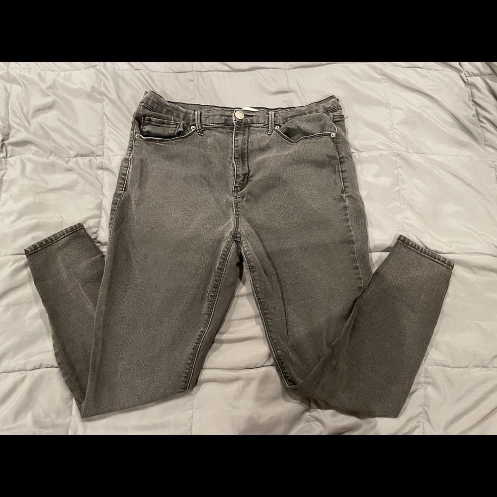 Black distressed skinny jeans.